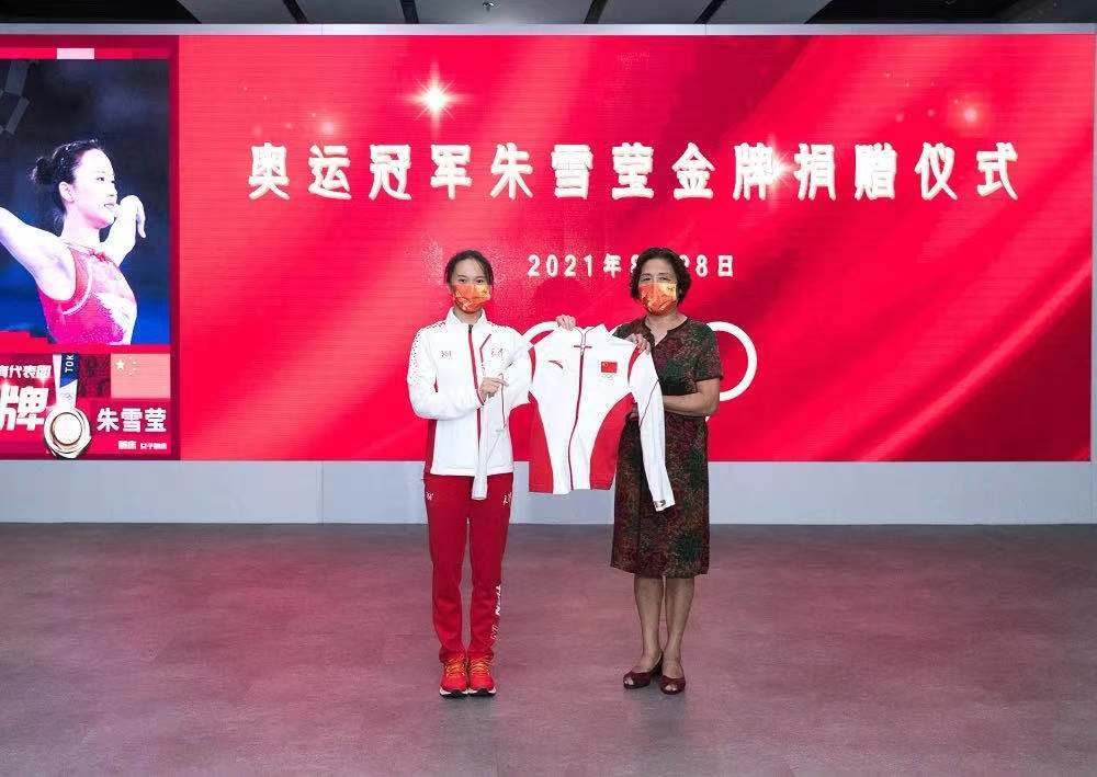朱雪莹成首个捐赠东奥会金牌运动员，她为何将这个金牌捐赠出去？
