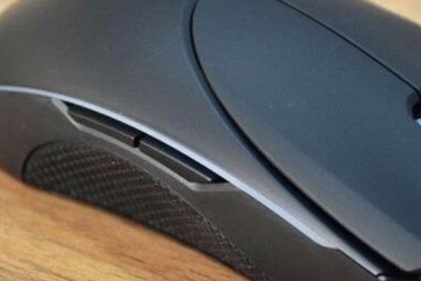 鼠标左侧的两个键是干什么用的怎么设置啊！