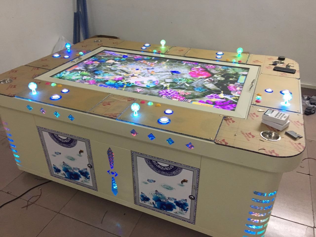 动漫城正版八人99炮打鱼机大概多少钱